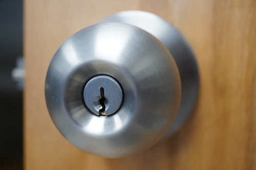 Silver door knob lock