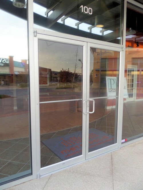 two glass storefront doors